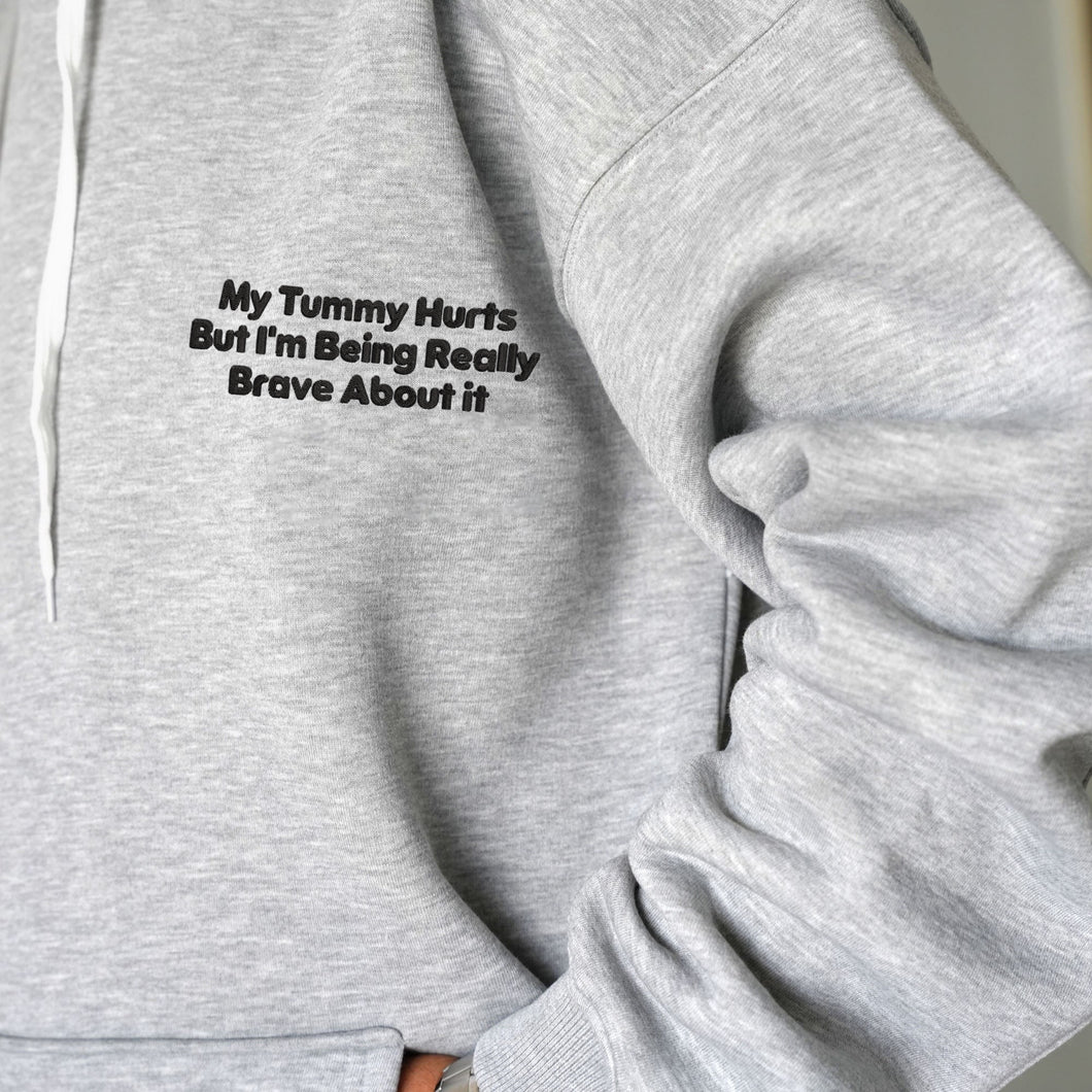 My Tummy Hurts But I'm Being Really Brave About it Embroidered Hoodie